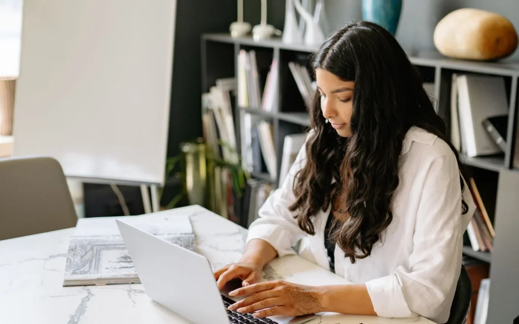 Business owner updating their own website content through a CMS