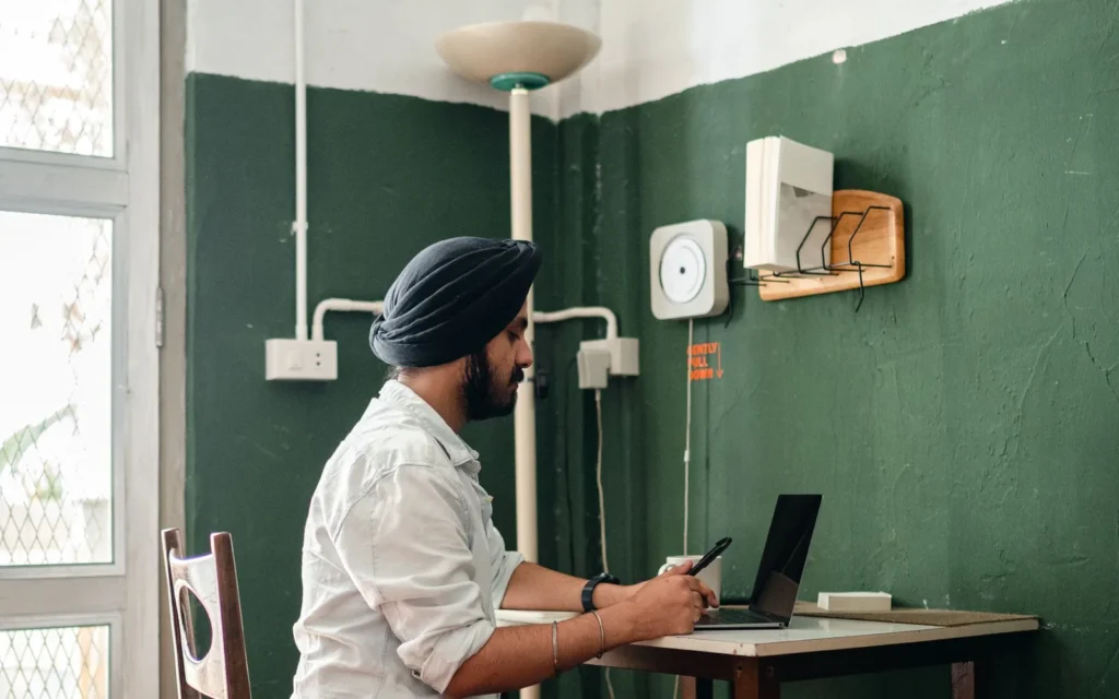 Business owner in Amalapuram reviewing new customer enquiries from their website