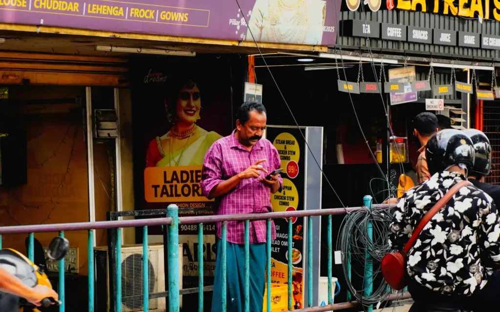 Business owner in Hyderabad reviewing new customer enquiries from their website